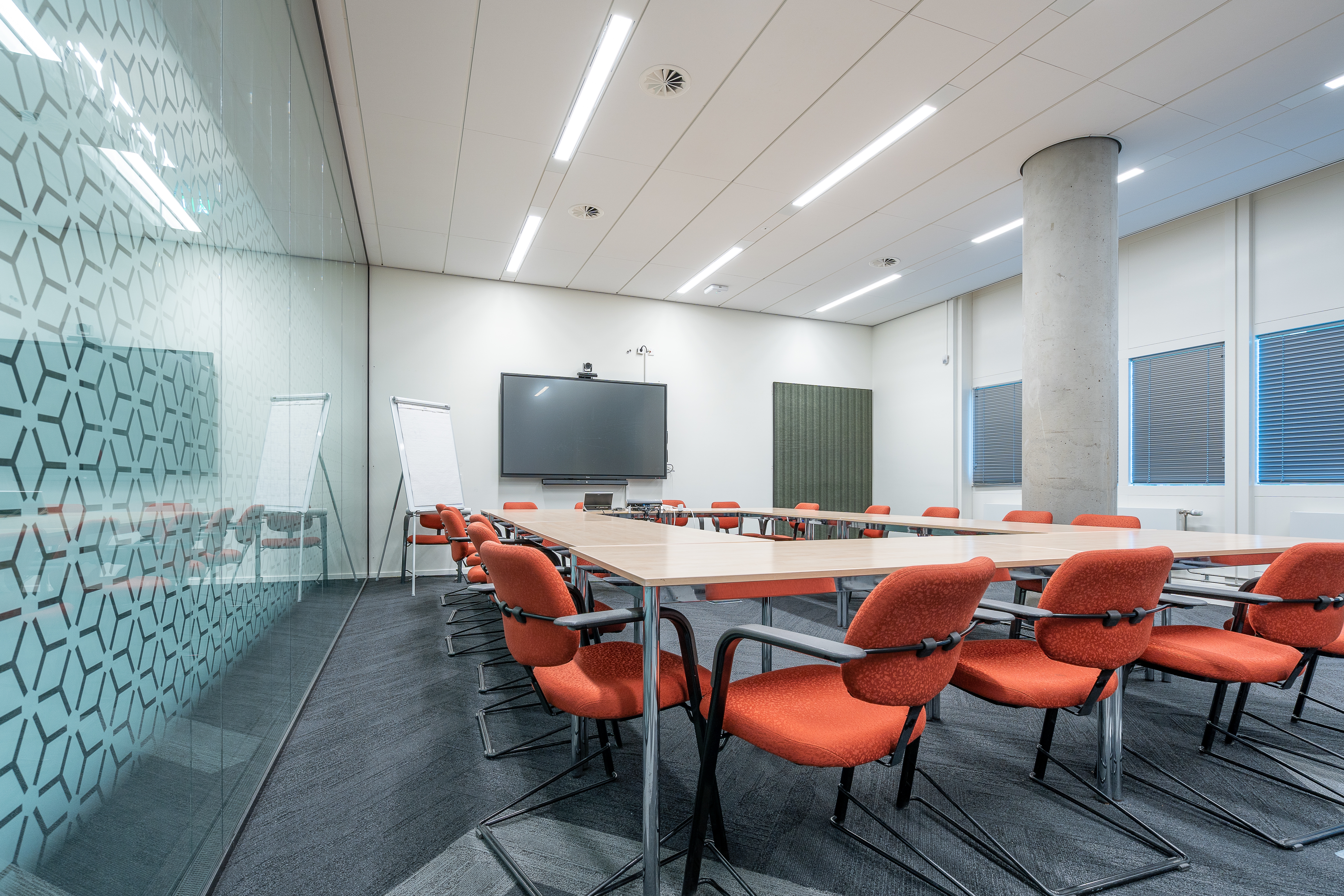 conference-room-interior-modern-office-with-white-walls-monitor.jpg